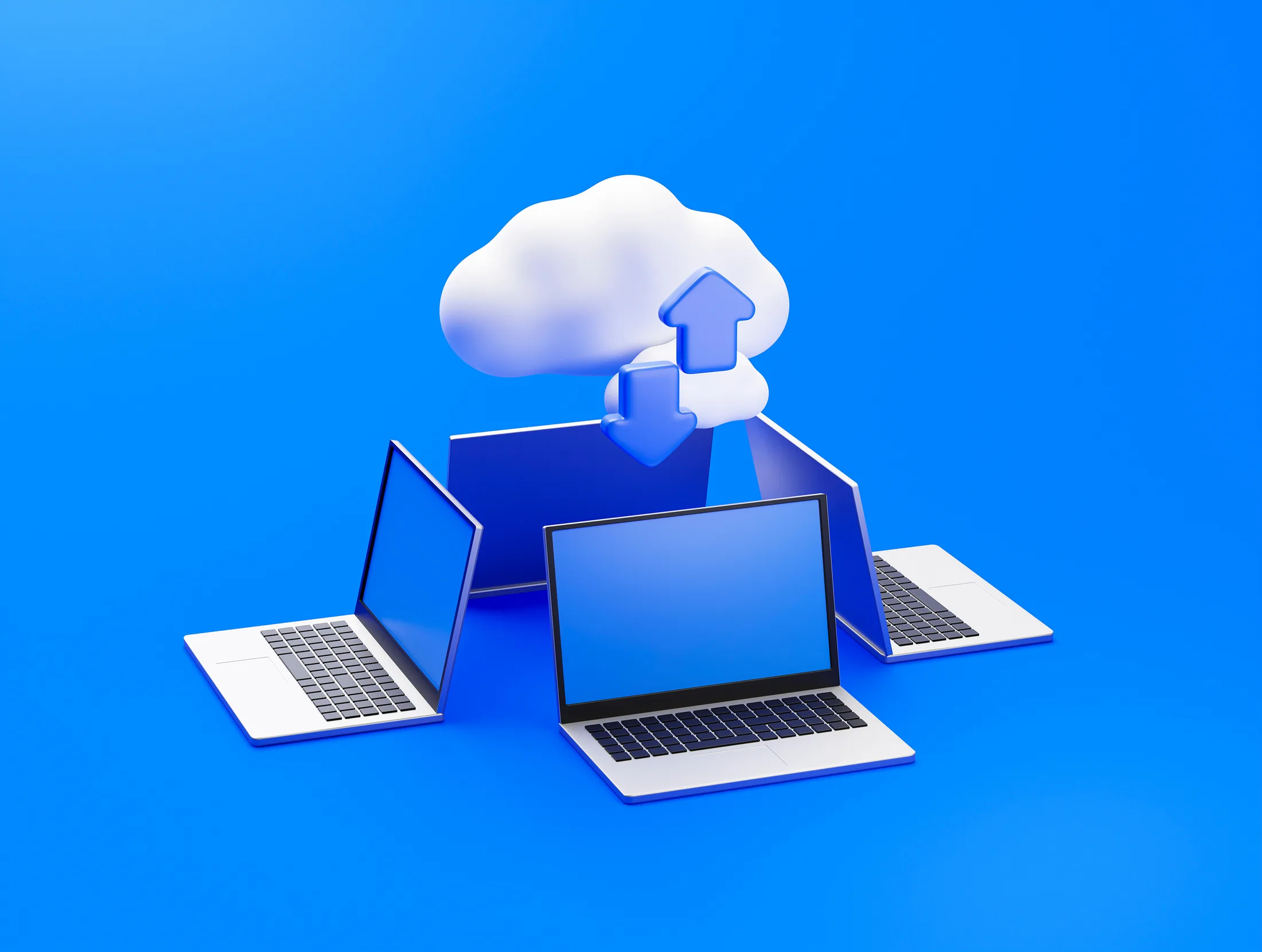 Cloud storage: Múltiples laptops conectadas a la nube para respaldar y compartir data online.